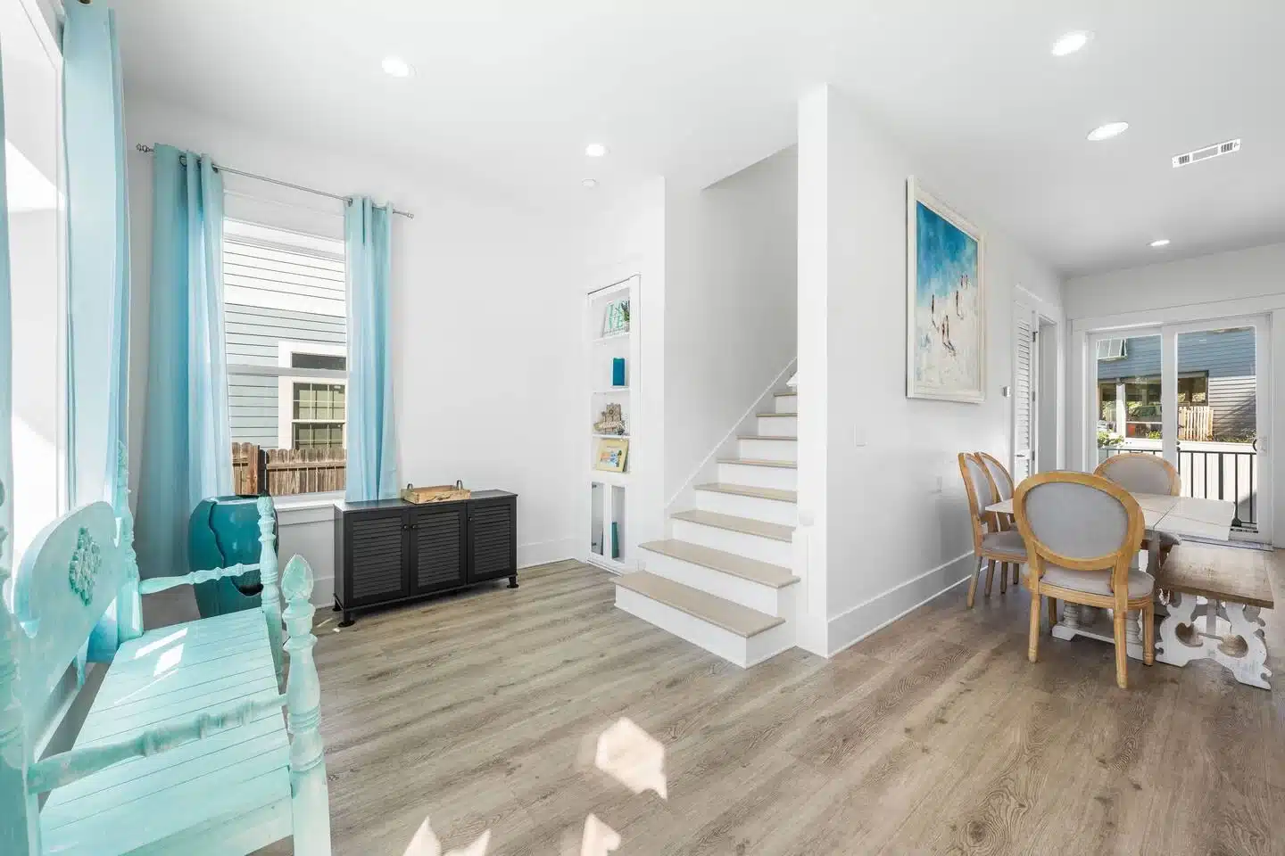 Open-concept living room that lets a whole family reunion share one house instead of splitting rentals